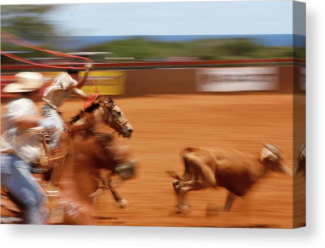 Poipu Rodeo Canvas Print featuring the photograph The Chase by Roger Mullenhour
