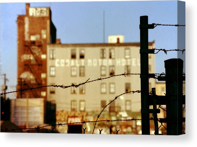 Urban Decay Canvas Print featuring the photograph The Cobalt Hotel by Kreddible Trout