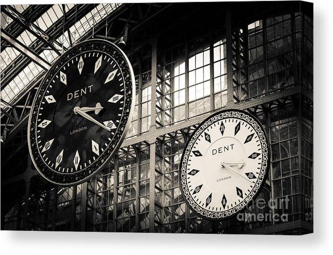 19 Century Canvas Print featuring the photograph The Dent clock and replica at St Pancras Railway Station by Peter Noyce