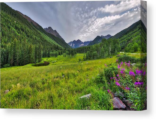 Maroon Bells Canvas Print featuring the photograph The Maroon Bells - Maroon Lake - Colorado by Photography By Sai