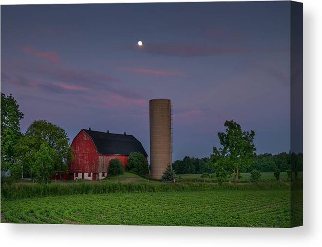 Barn Canvas Print featuring the photograph The Moon Over the Barn by Brent Buchner