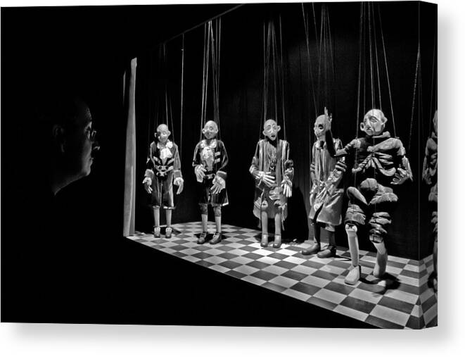 Puppets Canvas Print featuring the photograph The Puppeta?s Observer by Luis Sarmento