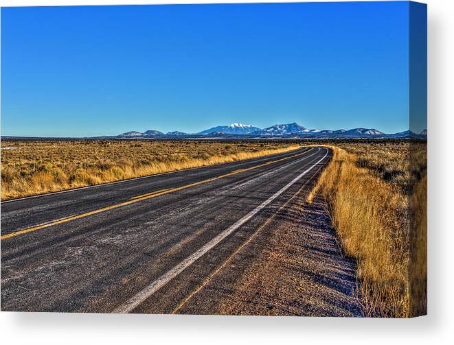 Flagstaff Az Canvas Print featuring the photograph The Road to Flagstaff by Harry B Brown