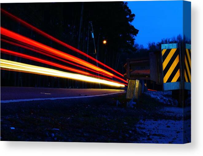 Light Trail Canvas Print featuring the photograph The Trail To... by Nicole Lloyd