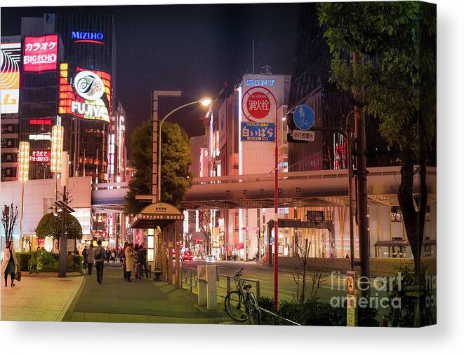 Pedestrians Canvas Print featuring the photograph Tokyo Streets, Japan by Perry Rodriguez