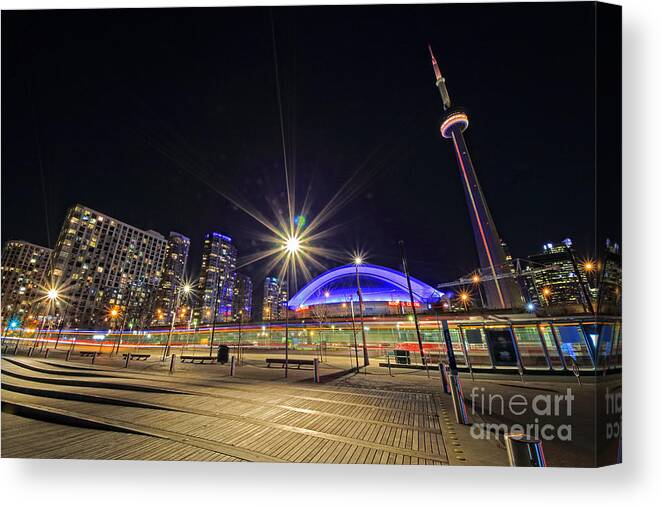 Toronto Canvas Print featuring the photograph Toronto Harbourfront Street Car Light Trails by Charline Xia