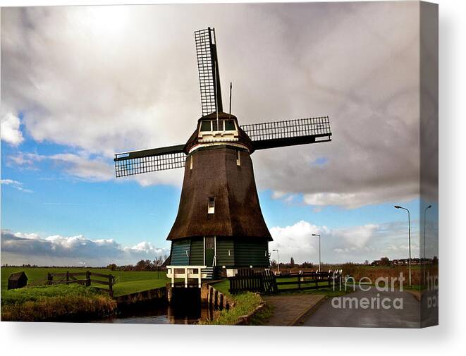 Traditional Dutch Windmill Canvas Print featuring the photograph Traditional Dutch Windmill near Volendam by Silva Wischeropp