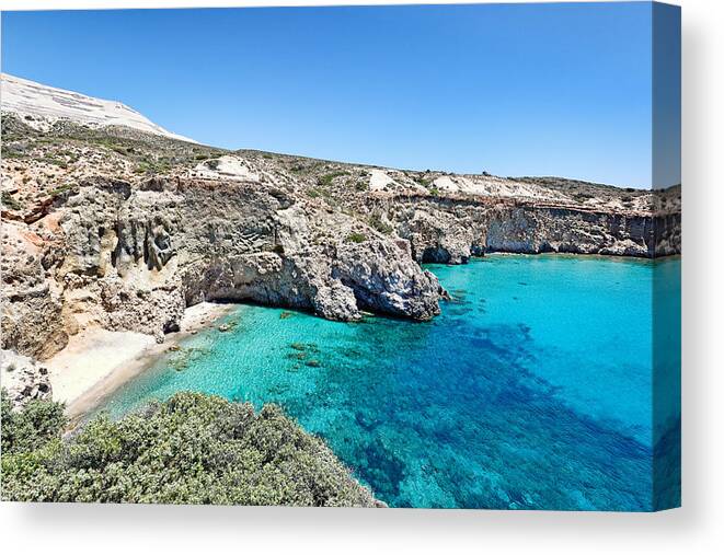 Milos Canvas Print featuring the photograph Tsigrado beach in Milos - Greece by Constantinos Iliopoulos