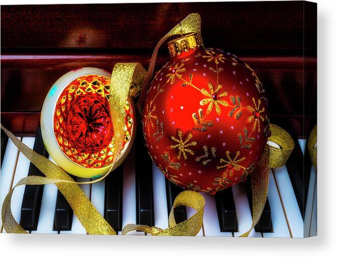 Christmas Canvas Print featuring the photograph Two Christmas Ornaments On Piano by Garry Gay