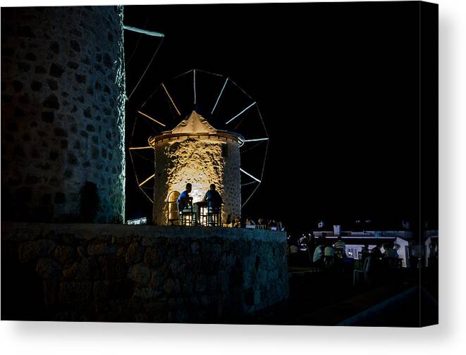 Alacati Canvas Print featuring the photograph Two Men Eating by the Alacati Windmills by Anthony Doudt