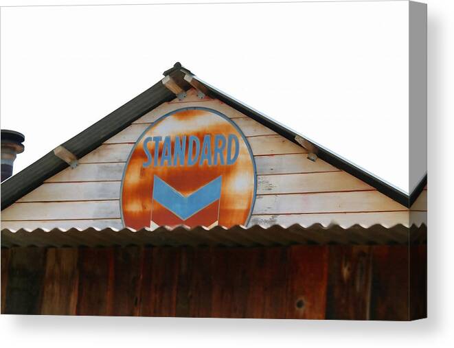 Standard Oil Canvas Print featuring the photograph Vintage Standard Oil Sign by Art Block Collections