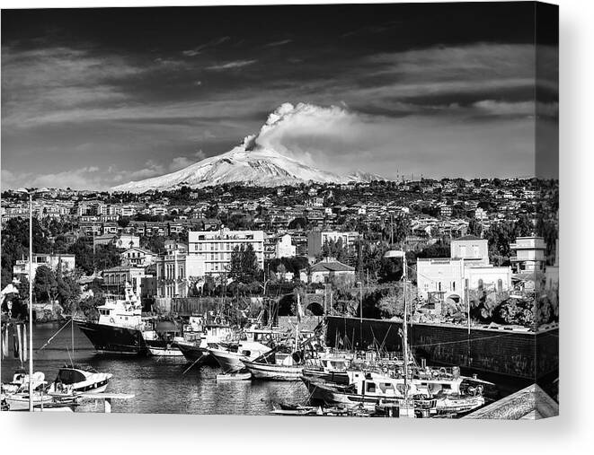 Volcano Canvas Print featuring the photograph Volcano Etna seen from Catania - Sicily. by Mirko Chessari