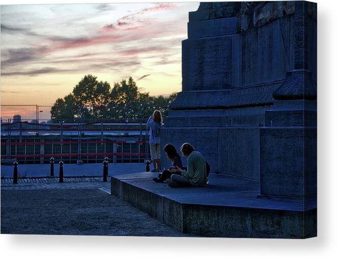 City Canvas Print featuring the photograph Watching the sunset by Ingrid Dendievel