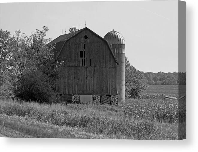 Barn Canvas Print featuring the photograph Weathered Wisconsin Barn In Black And White by Kay Novy