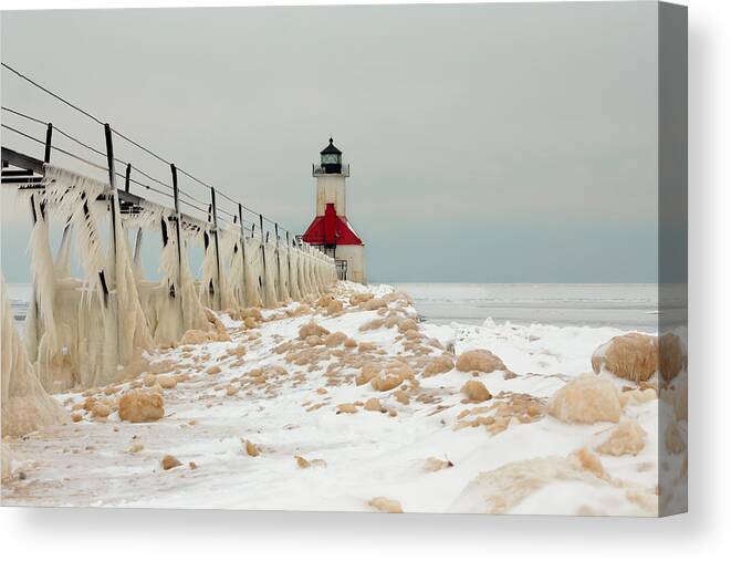 St Joseph Lighthouse Canvas Print featuring the photograph Winter at St. Joe's Light by Susan Rissi Tregoning