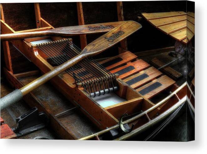 Wooden Rowboat Canvas Print featuring the photograph Wooden Rowboat And Oars by Carol Montoya