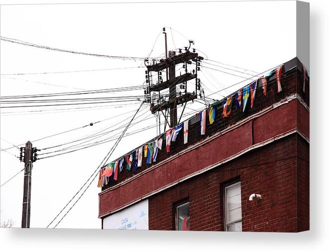 Flags Canvas Print featuring the photograph Worldly by Kreddible Trout