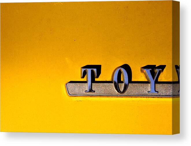 Toyota Canvas Print featuring the photograph Yellow Toy by Kreddible Trout