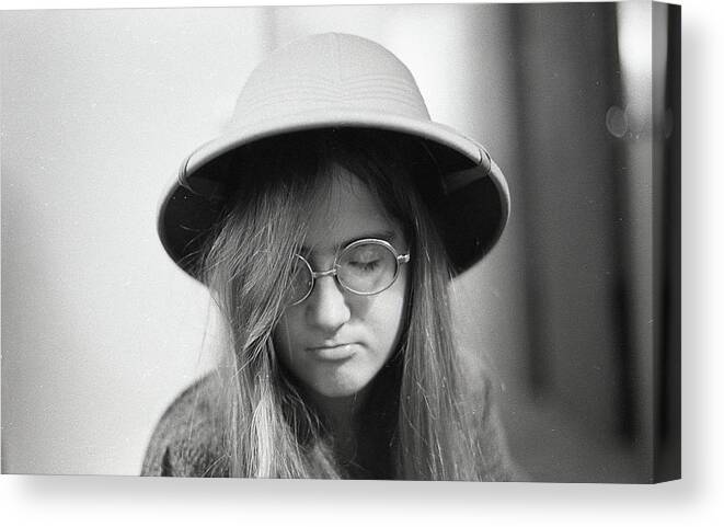 Pith Helmet Canvas Print featuring the photograph Young Woman with Long Hair, Wearing a Pith Helmet, 1972 by Jeremy Butler