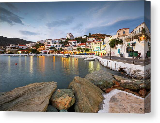 Greece Canvas Print featuring the photograph Batsi Village On The Coast Of Andros Island In Greece. #1 by Cavan Images