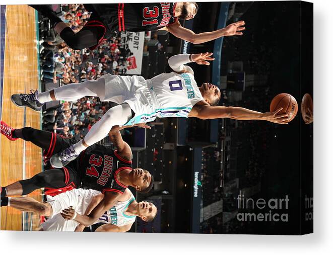 Chicago Bulls Canvas Print featuring the photograph Chicago Bulls V Charlotte Hornets by Kent Smith