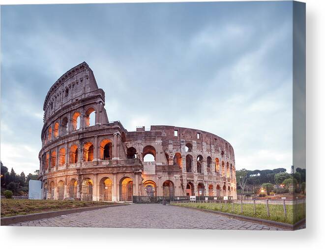 Arch Canvas Print featuring the photograph Colosseum At Sunrise, Rome, Italy #1 by Matteo Colombo