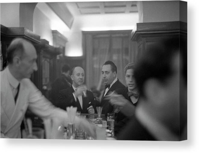 Black And White Canvas Print featuring the photograph Dior & Others At A Bar #1 by Frank Scherschel