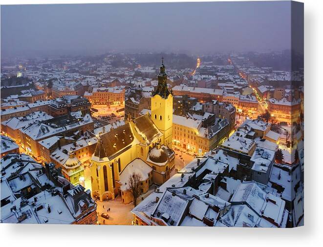 Landscape Canvas Print featuring the photograph Gorgeus Cityscape Of Winter Lviv City #1 by Ivan Kmit