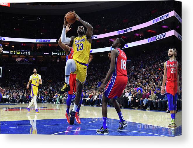 Nba Pro Basketball Canvas Print featuring the photograph Kobe Bryant And Lebron James by Jesse D. Garrabrant