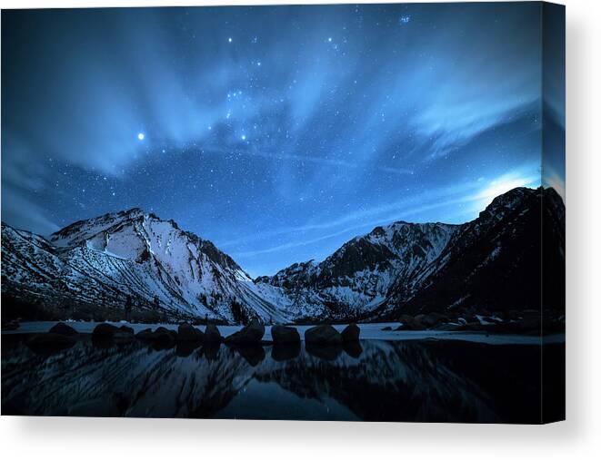Snowcapped Mountain Canvas Print featuring the photograph Scenic View Of Snowcapped Mountain Against Starry Sky #1 by Cavan Images