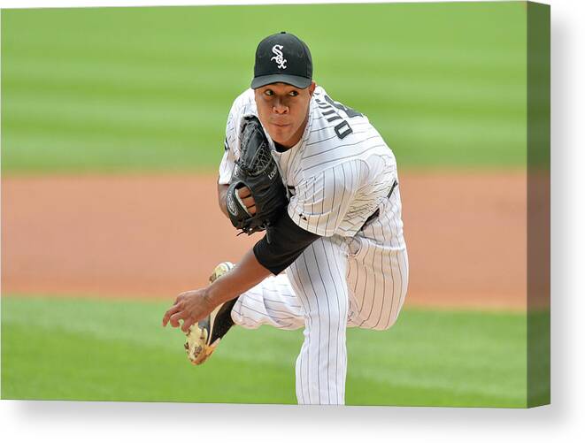 American League Baseball Canvas Print featuring the photograph Seattle Mariners V Chicago White Sox by Brian Kersey