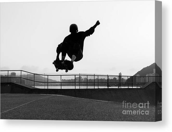 Knee-pad Canvas Print featuring the photograph Skateboarder Jumping In A Bowl by Will Rodrigues