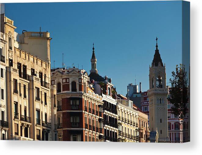 Dawn Canvas Print featuring the photograph Spain, Madrid, Salamanca Area #1 by Walter Bibikow