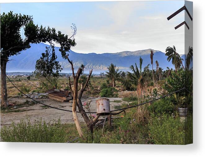 Beautiful Canvas Print featuring the photograph A sunny morning at the village petobo lost due to liquefaction #14 by Mangge Totok
