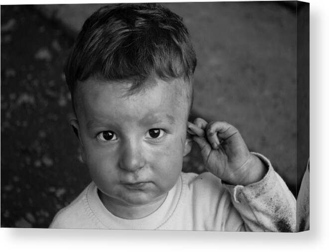 Boy Canvas Print featuring the photograph Boy Has Ears #2 by Cristian Fechete