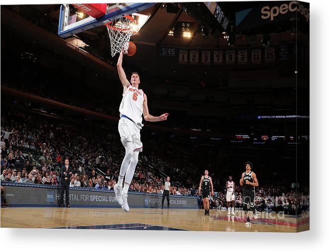 Kristaps Porzingis Canvas Print featuring the photograph Brooklyn Nets V New York Knicks by Nathaniel S. Butler