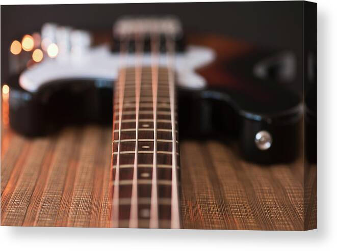 Rock Music Canvas Print featuring the photograph Close Up Of Bass Guitar #2 by Daniel Grill