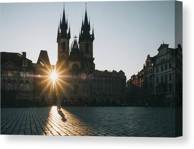 Bridge Canvas Print featuring the photograph Woman Walking At Old Town Square During Sunrise, In Prague, Czechia. #2 by Cavan Images