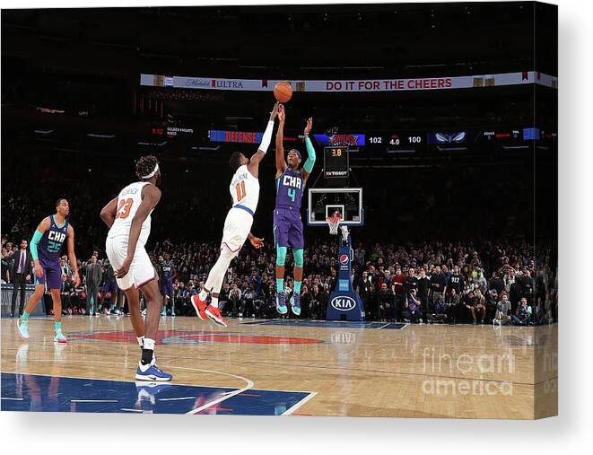 Devonte' Graham Canvas Print featuring the photograph Charlotte Hornets V New York Knicks #23 by Nathaniel S. Butler