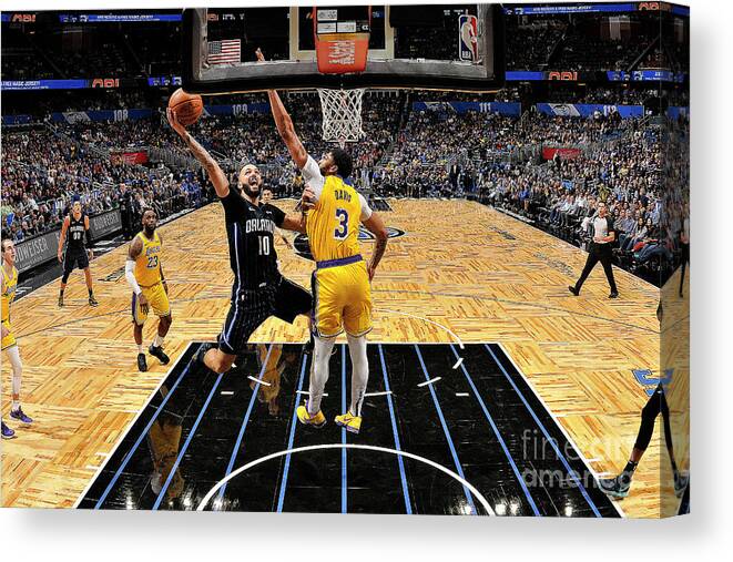 Evan Fournier Canvas Print featuring the photograph Los Angeles Lakers V Orlando Magic by Fernando Medina