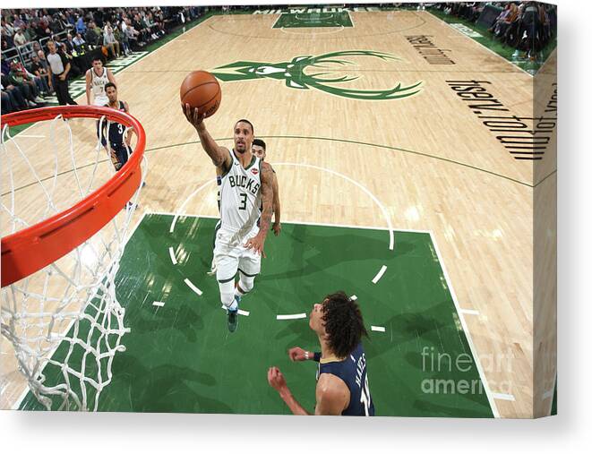 George Hill Canvas Print featuring the photograph New Orleans Pelicans V Milwaukee Bucks by Gary Dineen