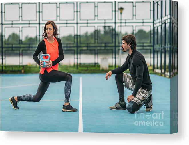 Fitness Canvas Print featuring the photograph Personal Trainer With Female Client #3 by Microgen Images/science Photo Library