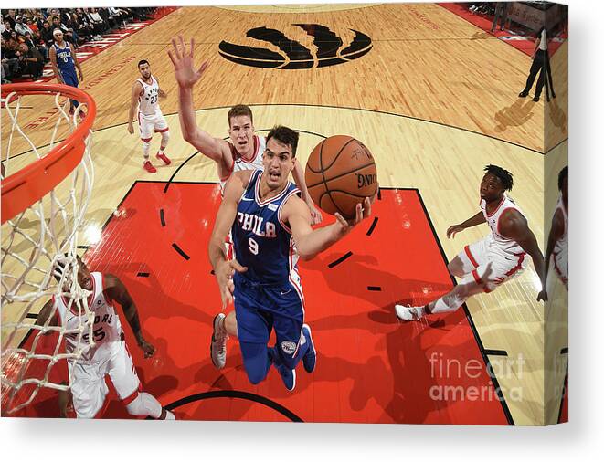 Dario Saric Canvas Print featuring the photograph Philadelphia 76ers V Toronto Raptors #4 by Ron Turenne