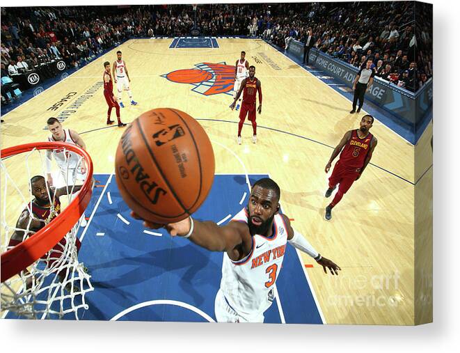 Tim Hardaway Jr. Canvas Print featuring the photograph Cleveland Cavaliers V New York Knicks by Nathaniel S. Butler