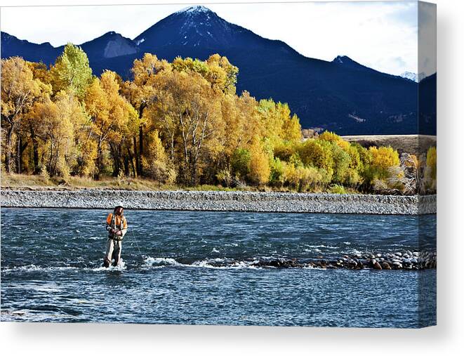 Three Quarter Length Canvas Print featuring the photograph A Athletic Man Fly Fishing Stands In A by Patrick Orton
