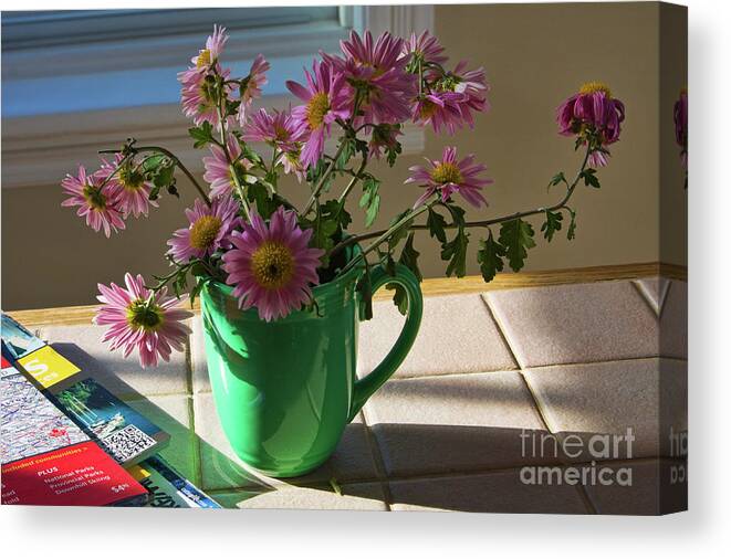 Still Life Canvas Print featuring the photograph A traveler still life with autumn flowers by Tatiana Travelways