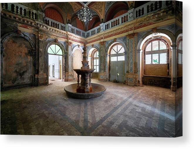 Urban Canvas Print featuring the photograph Abandoned Fountain in Decay by Roman Robroek