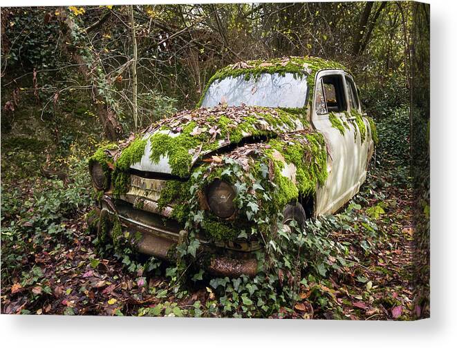 Urban Canvas Print featuring the photograph Abandoned Simca Car in the Woods by Roman Robroek