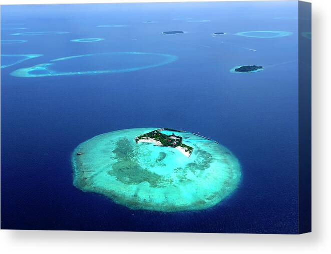 Sunlight Canvas Print featuring the photograph Aerial Photo From An Island Of The by Wolfgang steiner