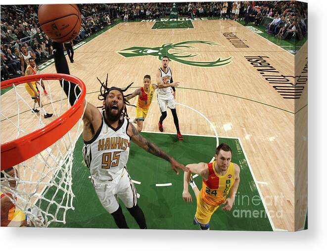 Nba Pro Basketball Canvas Print featuring the photograph Atlanta Hawks V Milwaukee Bucks by Gary Dineen